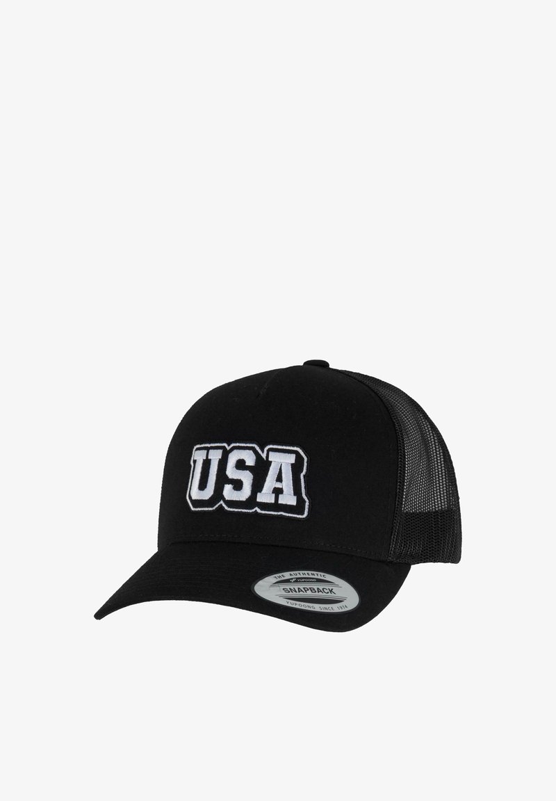 Crna snapback kapa s vezenim natpisom "USA" u bijeloj boji, s čvrstim prednjim dijelom i mrežastim stražnjim dijelom za ventilaciju. Klasik s zakrivljenim vizirjem.