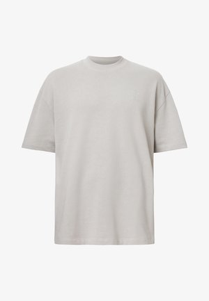 Lichtgrijze t-shirt met korte mouwen en ronde hals, gemaakt van zachte katoen, met een klein reliëflogo op de linkerborst.
