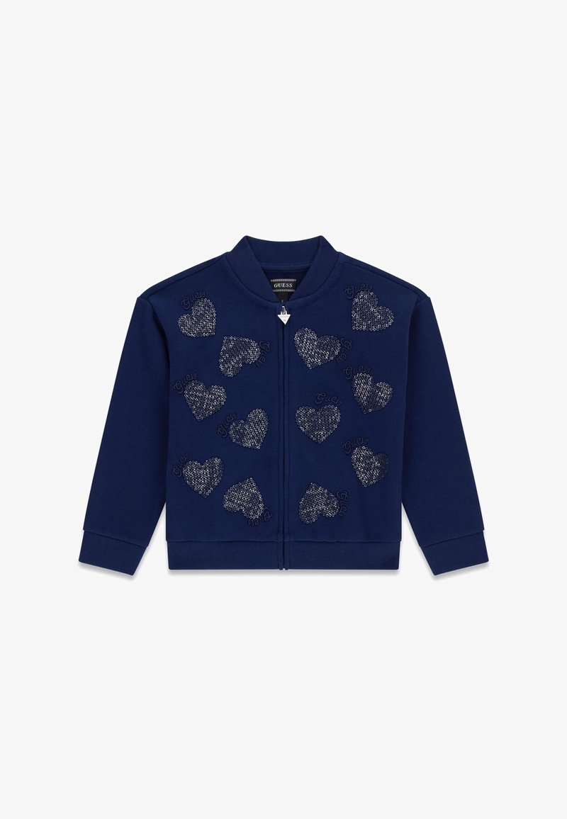 Felpa con zip di colore blu navy, caratterizzata da motivi a cuore in argento testurizzati e accenti con logo ricamato. Polsini e colletto a costine. Vestibilità casual.