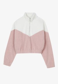 Pull en polaire avec un col montant, comprenant une partie supérieure blanche et une partie inférieure rose. Inclut une fermeture éclair à l'avant et un ourlet côtelé.