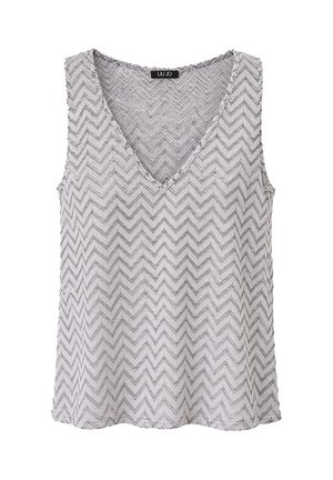 Top senza maniche con scollo a V, motivo a zigzag argento e bianco e trama brillante, etichettato Liu Jo.