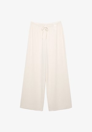 Kremne široke hlače z elastičnim pasom in vrvico. Narejene iz mehkega, teksturiranega blaga. Brez vidne opreme ali vzorcev.