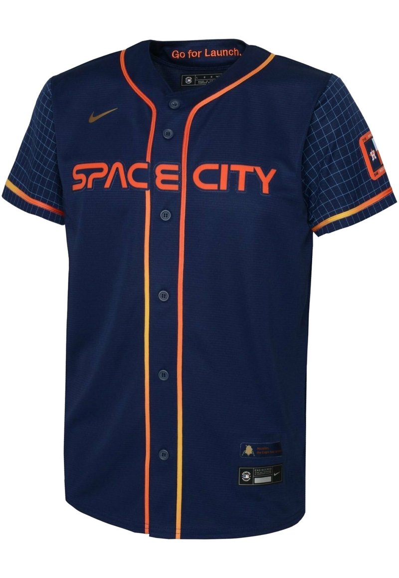 Lyhythihainen laivastonsininen baseball-paita, jossa oranssi "SPACE CITY" -teksti, keltaiset yksityiskohdat, napit ja ruudukkomalli hihoissa. Nike-logo kauluksella.