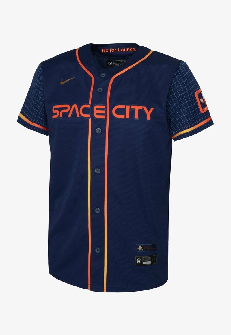 Námornícky modrý baseballový dres s krátkym rukávom, oranžovým nápisom "SPACE CITY", žltými detailmi, gombíkmi a mriežkovým vzorom na rukávoch. Logo Nike na golieri.