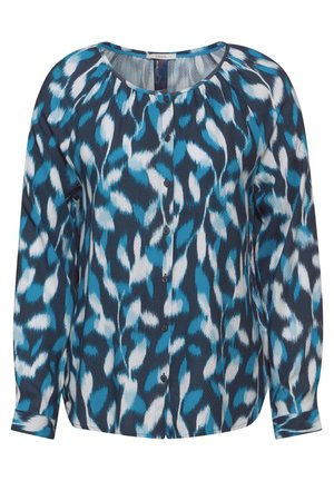 Pitkähihaisen nappipaidan sinivalkoinen abstrakti kuvio tummansinisen taustan päällä. Pehmeä tekstuuri ja pyöreä kaula-aukko.