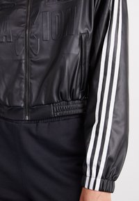 adidas Originals Mākslīgās ādas jaka - black