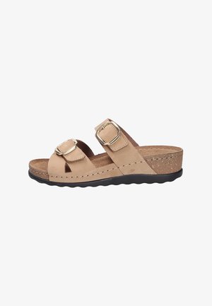 Beige offene Sandale mit zwei verstellbaren Schnallenriemen, Kork-Keilabsatz und schwarzer strukturierter Sohle.