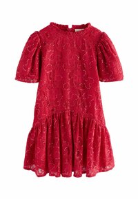Czerwona koronkowa sukienka z krótkimi bufiastymi rękawami, wysokim dekoltem i rozkloszowanym dołem z marszczonym wykończeniem. Iskrzące się cekiny stanowią ozdobę.