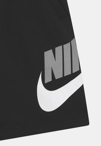 Nike Sportswear PLUS CLUB UNISEX - Teplákové kalhoty - black