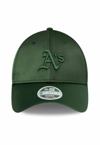 Dark green baseball cap with stitched "A's" logo on the front, adjustable strap, and curved visor. Smooth fabric texture.