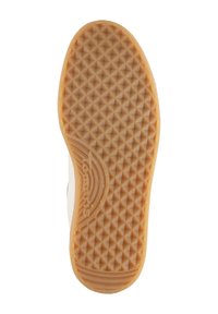 Gummisohlen eines Schuhs mit Diamantprofil, hellbrauner Farbe und eingeprägtem Markenlogo. Flaches Design mit abgerundeten Kanten.