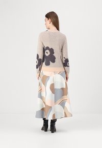 Marimekko TUNNELMA UNIKKO - Stickad tröja - light pink/dark grey