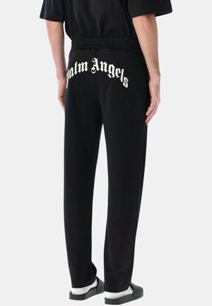 Pantaloni jogger neri realizzati in tessuto morbido, con vita a coste e logo bianco "Palm Angels" stampato sul retro.