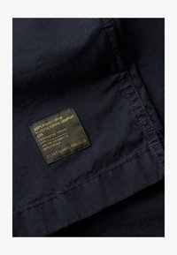 Ausgewählt, eclipse navy