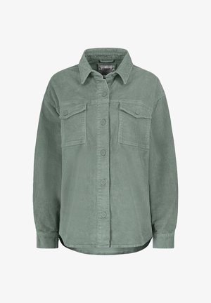 Green corduroy shirt with a button-up front, two chest pockets, and a collared neckline. Features textured fabric and a relaxed fit.