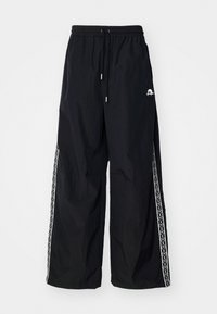 TRACK PANTS UNISEX - Pantalones deportivos - black