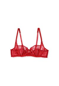 Czerwona koronkowa braletka z wyściełanymi miseczkami, z falistymi krawędziami, regulowanymi satynowymi ramiączkami oraz centralnym ozdobnym elementem metalowym.