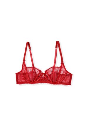 Bralette de encaje rojo con copas acolchadas, con bordes en forma de ondas, tirantes de satén ajustables y un adorno central decorativo de metal.