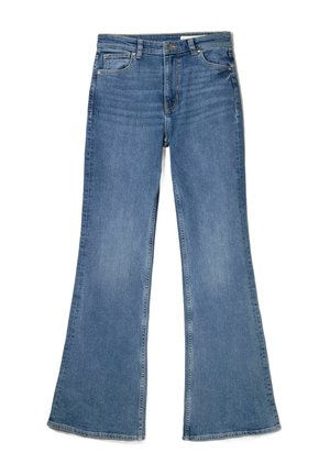 Schmal geschnittene blaue Jeans aus Denim mit mittelhohem Bund, fünf Taschen und einem verblassten Textur mit Nahtdetails entlang der Nähte.