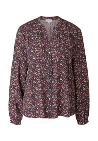 Blouse à manches longues avec boutonnière devant dans un motif abstrait multicolore comprenant du rouge, jaune et blanc sur un fond sombre.