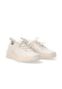 Helle beige Leder-Sneaker mit runder Zehenpartie, Schnürdesign und texturierter Gummisohle mit Wellenmuster und Dämpfung.