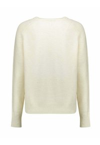 Maglione color crema con vestibilità rilassata, maniche lunghe e polsini a coste, realizzato in un tessuto morbido e strutturato con un design semplice.