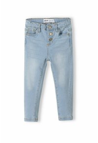 Jeans de mezclilla azul claro con una textura suave, corte ajustado, cinco bolsillos y cierre de tres botones en la cintura. Acabado desgastado y dobladillos cosidos.