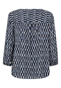 Marineblauwe en crème gebloemde blouse met lange mouwen en gerimpelde achterkant, voorzien van een algehele abstracte print en een losse pasvorm.