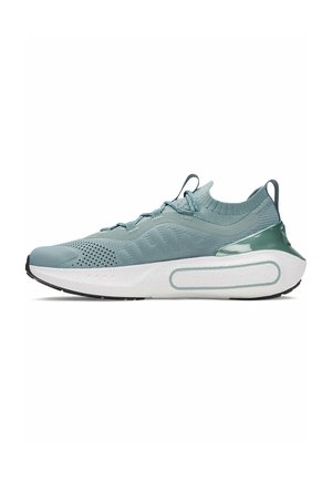 Light blue athletic sneaker with a knit upper, textured patterns, elastic laces, and a white midsole with a green accent on the heel.