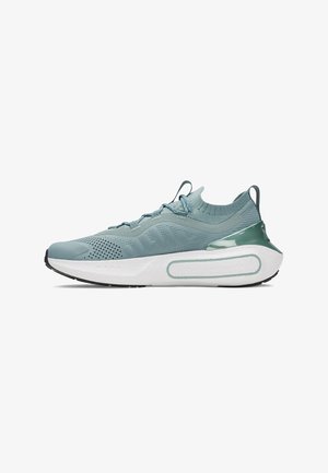 Light blue athletic sneaker with a knit upper, textured patterns, elastic laces, and a white midsole with a green accent on the heel.