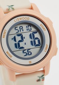 Orologio digitale con scatola e cinturini rosa con un motivo floreale. Il display mostra l'ora 12:16 con icone per il giorno e i secondi.