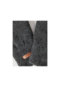 Gants gris en tricot avec des poignets côtelés, comportant une étiquette en cuir marron emboutie avec "BARTS," mettant en valeur la texture et le matériau.
