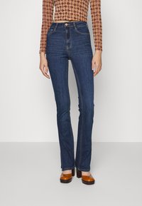 Gina Tricot MOLLY SLIT JEANS - Calças de ganga de corte skinny - rinse