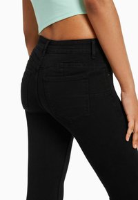 Bershka Vaqueros pitillo - black