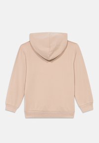 Μπεζ φούτερ με μακριά μανίκια και ριγωτές μανσέτες και κάτω μέρος, εμφανιζόμενο από την πίσω πλευρά σε λευκό φόντο.