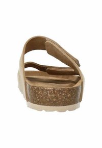 Infradito color beige con una piattaforma in sughero, caratterizzati da una suola marrone strutturata. Due cinturini regolabili in materiale morbido.