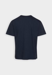 T-shirt à manches courtes bleu marine avec un col rond. Fabriqué en tissu coton doux, avec un design uni et une coupe décontractée.