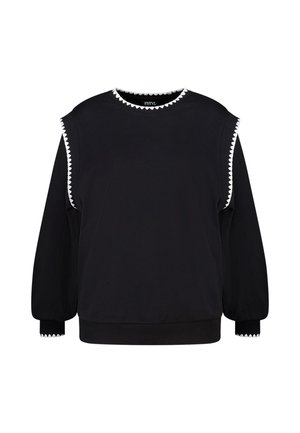 Sweat-shirt noir à manches longues avec gilet sans manches noir par-dessus, tous deux bordés d'une bordure blanche en forme de festons au niveau du col, des emmanchures et des poignets.