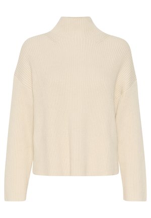 Krämfärgad, ribbad stickad tröja med hög krage och sänkta axlar; mjuk textur och kort längd. Ingen synlig hårdvara eller dekorationer.