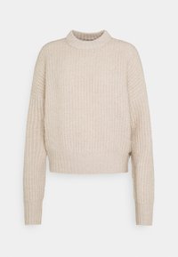 Maglione lavorato a maglia beige con colletto alto, vestibilità comoda e polsini a costine. Presenta un motivo testurizzato su tutta la superficie ed è di lunghezza cropped.