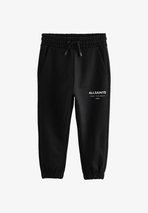 Pantaloni jogger neri con vita e polsini elastici, tasche laterali e logo bianco "ALLSAINTS" con testo giapponese sulla coscia destra.