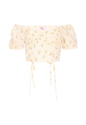 Top scurt crem, cu decolteu pe umeri, mâneci bufante, partea din față adunată, imprimeu delicat cu trandafiri galbeni și șnururi reglabile la tiv.