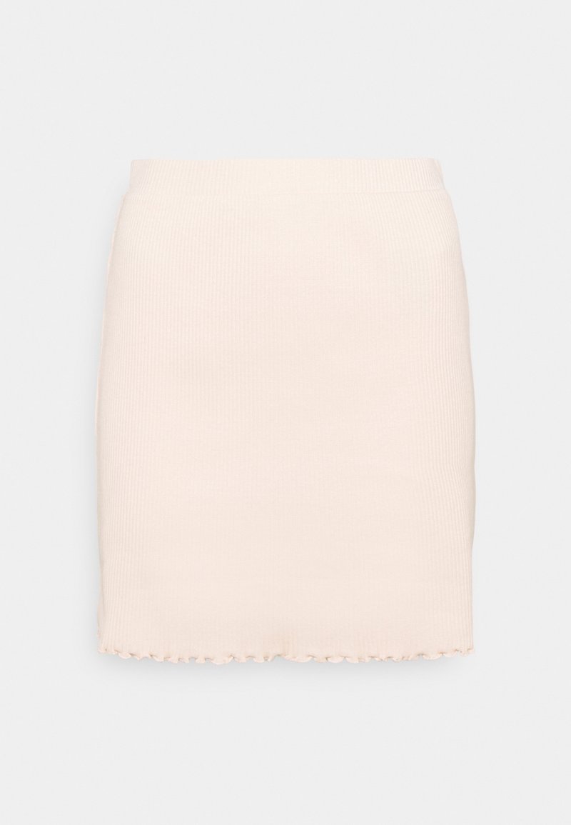 Mini-jupe en maille côtelée crème avec un ourlet ondulé et une taille ajustée.