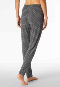 Gray patterned pajama pants with a relaxed fit, featuring a diamond design in lighter shades. Elastic waistband, soft fabric texture.