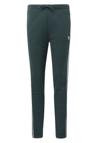 Green sweatpants made of soft fabric, featuring a drawstring waistband and white side stripes, with a small logo on the left thigh.