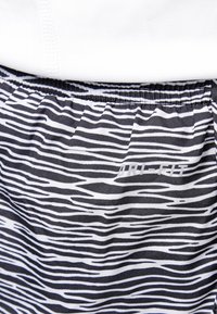 Nike Performance Urheilushortsit - black