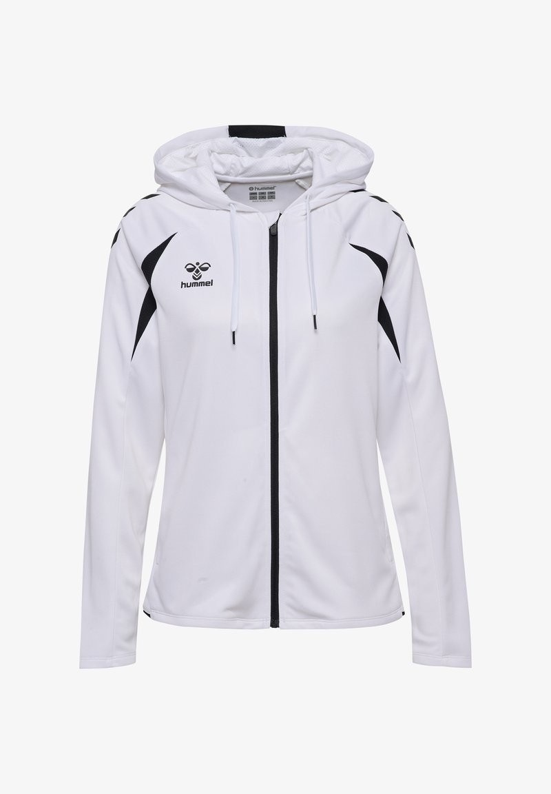 Sweat à capuche zippé blanc avec accents noirs, cordons de serrage et logo hummel sur la poitrine et les épaules, présenté sur un fond blanc.