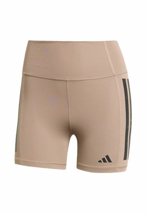 Shorts de sport beiges en tissu extensible avec des rayures verticales noires sur les côtés et un logo en bas à droite.
