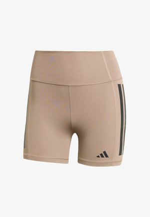Pantalones cortos deportivos beige hechos de una tela elástica, con rayas verticales negras en los costados y un logotipo en la parte inferior derecha.