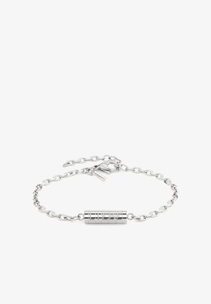Silver bracelet featuring a linked chain design with a cylindrical charm engraved with "LIEBE." Secured with a lobster clasp and extension chain.